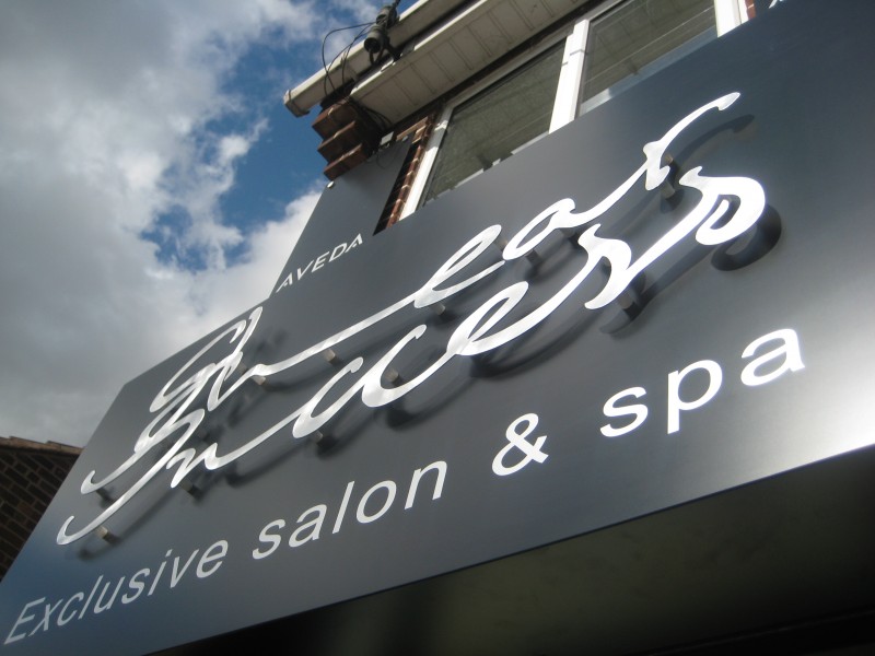 Salon sign in mixed printed and aluminium lettering